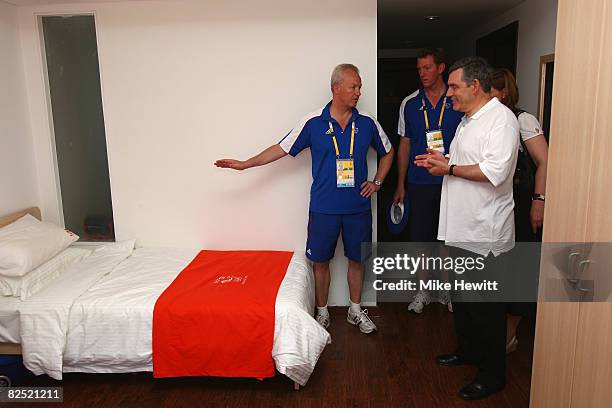 Prime Minister Gordon Brown is shown an athlete's apartment by British Olympic Association team manager Simon Clegg during a meeting with Team GB...