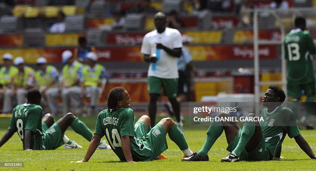 (From L) Nigerian midfielder Sani Kaita,