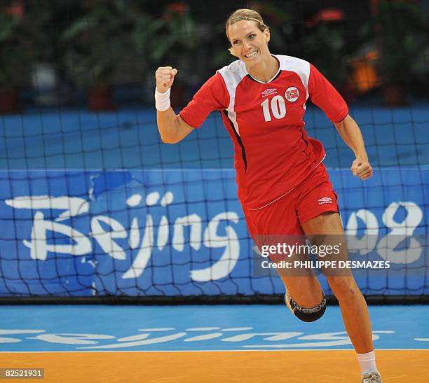 Norway's Gro Hammerseng celebrates after scoring against Russia during the women's handball gold medal match of the 2008 Beijing Olympic Games on...