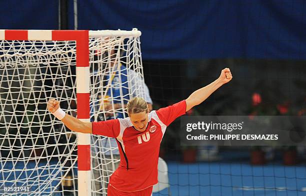 Norway's Gro Hammerseng celebrates after scoring against Russia during the women's handball gold medal match of the 2008 Beijing Olympic Games on...