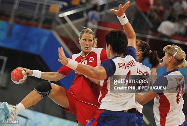 Norway's Gro Hammerseng aims at Russia's goal during the women's handball gold medal match of the 2008 Beijing Olympic Games against Russia on August...