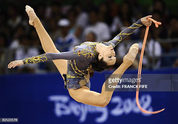 Ukraine's Ganna Bessonova competes in the individual all-around final of the rhythmic gymnastics at the Beijing 2008 Olympic Games in Beijing on...