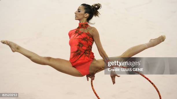 Spain's Almudena Cid competes in the individual all-around final of the rhythmic gymnastics at the Beijing 2008 Olympic Games in Beijing on August...