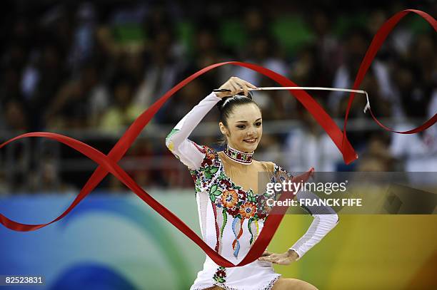 Ukraine's Ganna Bessonova competes in the individual all-around final of the rhythmic gymnastics at the Beijing 2008 Olympic Games in Beijing on...