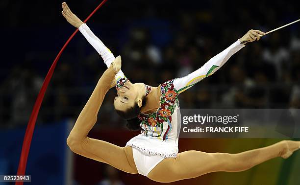 Ukraine's Ganna Bessonova competes in the individual all-around final of the rhythmic gymnastics at the Beijing 2008 Olympic Games in Beijing on...