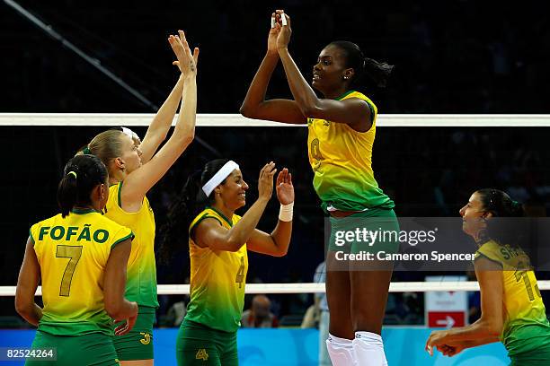 Fabiana Claudino of Brazil celebrates with her teammates during the women's gold medal volleyball game against the United States held at the Beijing...