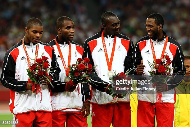 The silver medal team of Trinidad and Tobago stand on the podium during the medal ceremony for the Men's 4 x 100m Relay Finalheld at the National...