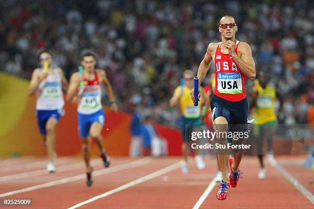Jeremy Wariner of the United States runs in the final leg of the Men's 4 x 400m Relay Final held at the National Stadium on Day 15 of the Beijing...