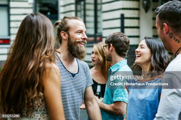 a group of friends meeting together at barbecue - have your say photos et images de collection