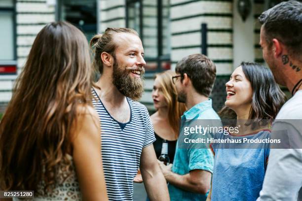a group of friends meeting together at barbecue - millennial generation foto e immagini stock