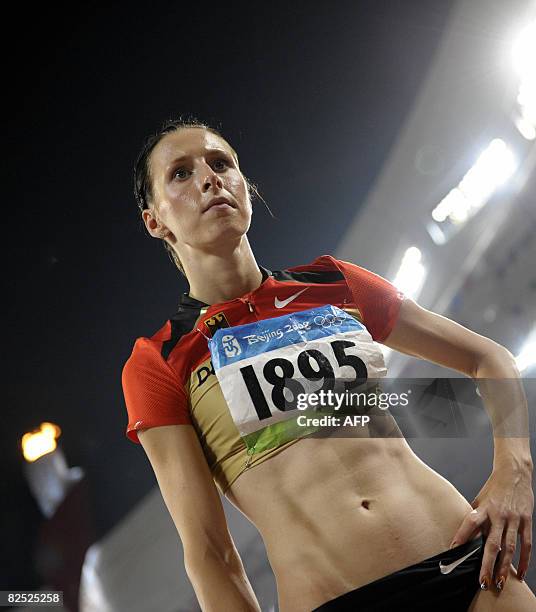 Germany's Ariane Friedrich reacts after being ranked seventh in the women's high jump final at the "Bird's Nest" National Stadium during the 2008...