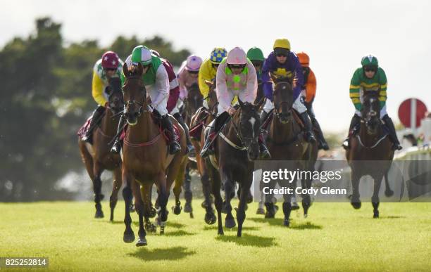 Galway , Ireland - 1 August 2017; Eventual winner Three Wise Men, front left, with Noel Fehily up, lead the field on their way to winning the Latin...