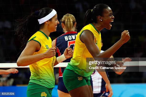 Paula Pequeno and Fabiana Claudino of Brazil celebrate during the women's gold medal volleyball game held at the Beijing Institute of Technology...