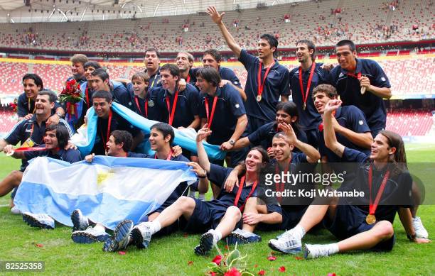 The Argentinian team celebrate gold during the Men's Final between Nigeria and Argentina at the National Stadium on Day 15 of the Beijing 2008...