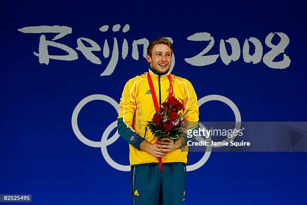 Matthew Mitcham of Australia celebrates his gold medal in the Men's 10m Platform Final diving event held at the National Aquatics Center on Day 15 of...