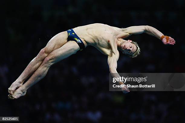 Matthew Mitcham of Australia competes on way to winning the gold medal in the Men's 10m Platform Final diving event held at the National Aquatics...