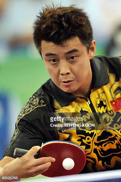 China's Wang Hao plays against his compatriot Ma Lin in the men's singles table tennis final match at the 2008 Beijing Olympic Games on August 23,...