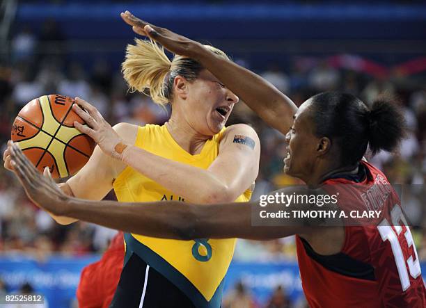 Australia's Suzy Batkovic vies with USA's Sylvia Fowles during the women's basketball gold medal match Australia against The US of the Beijing 2008...