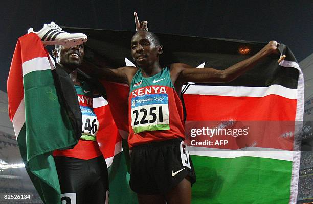 Kenya's Wilfred Bungei and Alfred Kirwa Yego celebrate following the men's 800m final at the "Bird's Nest" National Stadium during the 2008 Beijing...