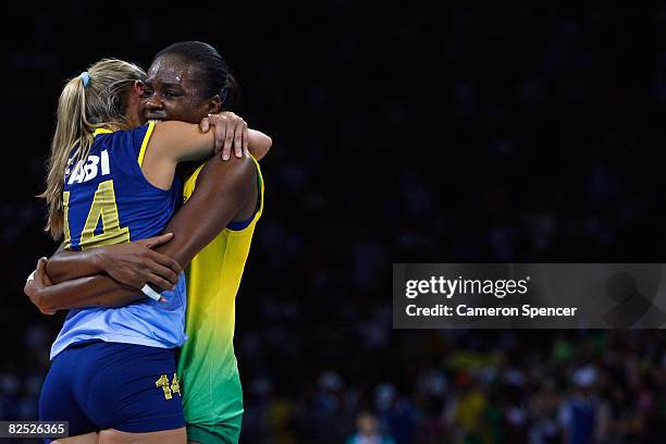 Fabiana de Oliveira and Fabiana Claudino of Brazil celebrate after winning the women's gold medal volleyball game against the United States held at...