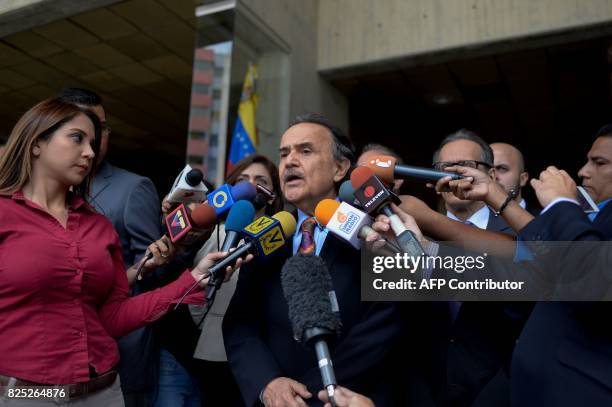 Omar Estacio, lawyer of opposition leader Antonio Ledezma, talks to the press outside the Supreme Court building in Caracas on August 1, 2017....