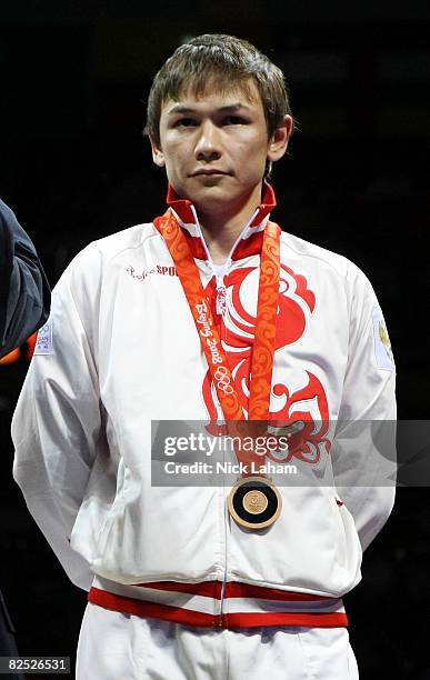 Bronze medalist Georgy Balakshin of Russia stands on the podium during the medal ceremony for the Men's Fly Final Bout held at Workers' Indoor Arena...