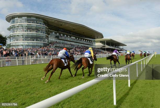 Galway , Ireland - 1 August 2017; A general view of runners and riders racing up the home straight during the Colm Quinn BMW Irish EBF Fillies Maiden...