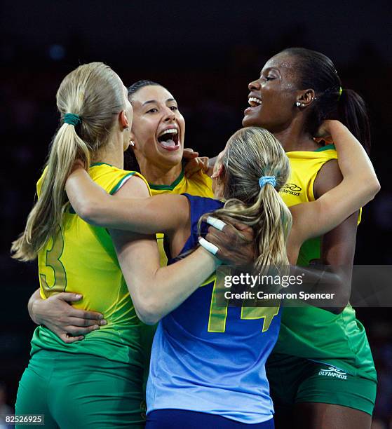Marianne Steinbrecher, Sheilla Castro, Fabiana De Oliveira and Fabiana Claudino of Brazil of Brazil celebrate after winning the women's gold medal...