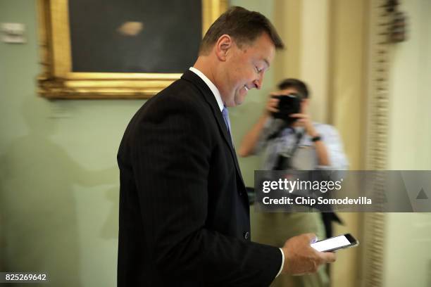 Sen. Dean Heller heads into the Senate Republican policy luncheon at the U.S. Capitol August 1, 2017 in Washington, DC. After failing to pass...