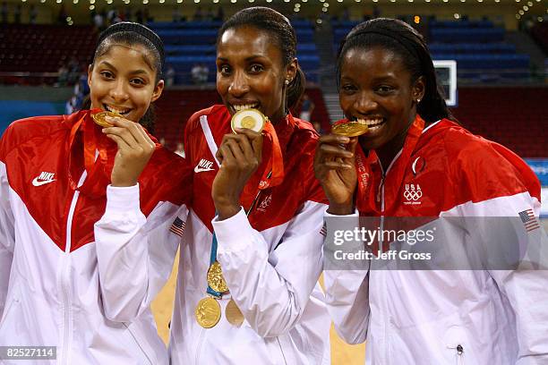 Candace Parker, Lisa Leslie and Delisha Milton-Jones pose after winning the gold medal against Australia at the Beijing Olympic Basketball Gymnasium...