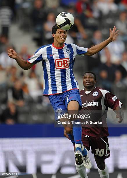 Kaka of Berlin heads the ball while Christopher Katongo of Bielefeld looks on during the Bundesliga match between Hertha BSC Berlin and Arminia...