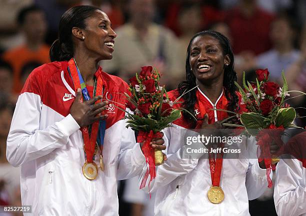 Lisa Leslie and Delisha Milton-Jones celebrate after winning the gold medal against Australia at the Beijing Olympic Basketball Gymnasium on Day 15...
