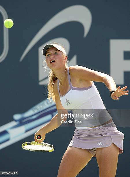 Caroline Wozniacki of Denmark returns a shot to Anna Chakvetadze of Russia during the women's singles championship match on Day 6 of Pilot Pen Tennis...