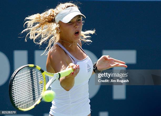 Carolina Wozniacki of Denmark returns to Anna Chakvetadze of Russia during the women's singles championship during Day 6 of Pilot Pen Tennis on...