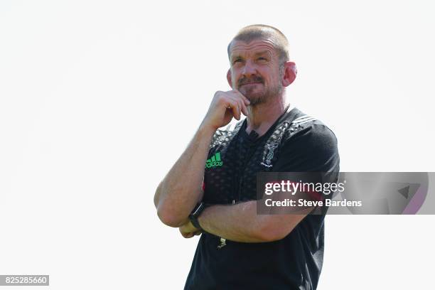 The Harlequins forwards coach, Graham Rowntree looks on during a training session at the Adi-Dassler Stadion on August 1, 2017 in Herzogenaurach,...