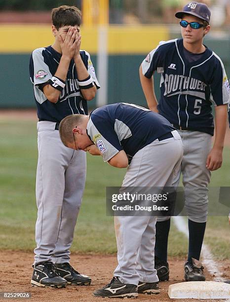 Nicholas Abshire, Grant Phillips and Hunter Dupin of the Southwest react after losing to the West in the United States Final at Lamade Stadium on...