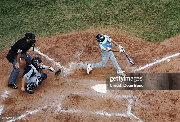 Tanner Tokunaga of the West hits a game-winning two RBI single in the bottom of the sixth inning against the Southwest during the United States Final...