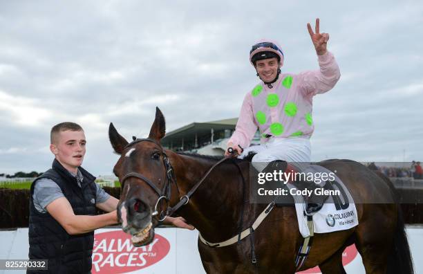 Galway , Ireland - 1 August 2017; Declan McDonogh celebrates after winning the Colm Quinn BMW Mile Handicap on Riven Light during the Galway Races...