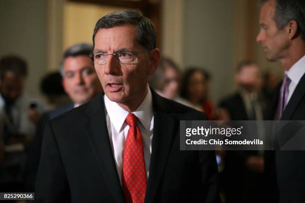 Sen. John Barrasso talks to reporters following the Republican Senate policy luncheon at the U.S. Capitol August 1, 2017 in Washington, DC. After...
