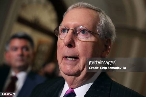Senate Majority Leader Mitch McConnell talks with reporters following the Republican Senate policy luncheon at the U.S. Capitol August 1, 2017 in...
