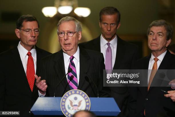 Senate Majority Leader Sen. Mitch McConnell speaks to members of the media at the Capitol as Sen. John Barrasso , Sen. John Thune and Sen. Roy Blunt...