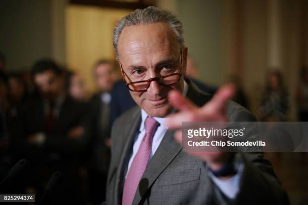 Senate Minority Leader Charles Schumer talks with reporters following the Senate Democratic policy luncheon at the U.S. Capitol August 1, 2017 in...