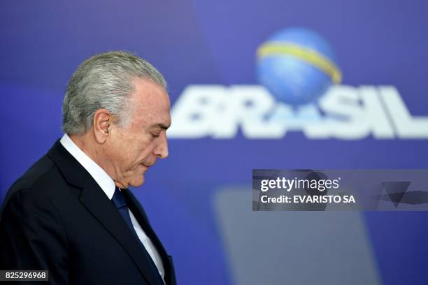 Brazilian President Michel Temer gestures during the announcement of the launching of a new medical college, at Planalto Palace in Brasilia, on...