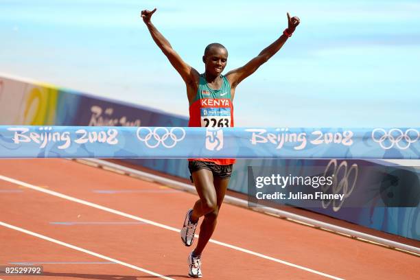 Sammy Wanjiru of Kenya crosses the finish line to win the Men's Marathon in the National Stadium during Day 16 of the Beijing 2008 Olympic Games on...