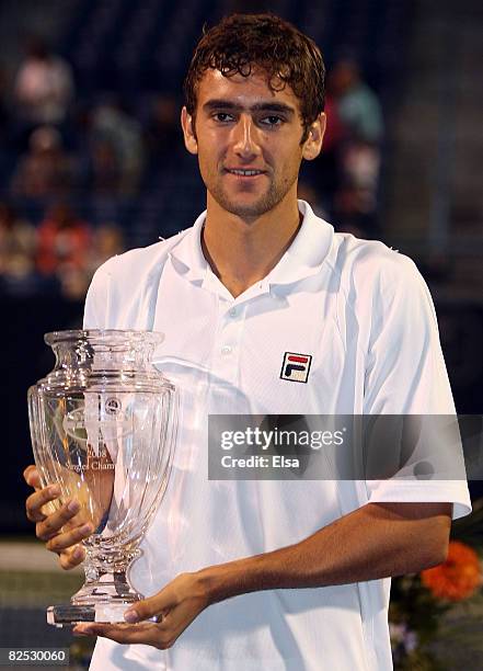 Marin Cilic of Croatia poses with his trophy after his match win over Mardy Fish in the men's singles championship match during Day 6 of Pilot Pen...