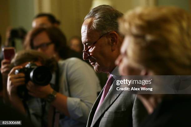 Senate Minority Leader Sen. Chuck Schumer listens during a media briefing at the Capitol August 1, 2017 in Washington, DC. Senate Deomcrats held...