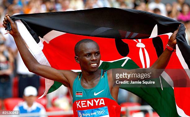 Sammy Wanjiru of Kenya celebrates after winning the Men's Marathon in the National Stadium during Day 16 of the Beijing 2008 Olympic Games on August...