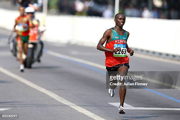 Sammy Wanjiru of Kenya at the head of the field during the Men's Marathon on the way to the National Stadium during Day 16 of the Beijing 2008...