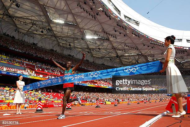 Sammy Wanjiru of Kenya crosses the finish line to win the Men's Marathon in the National Stadium during Day 16 of the Beijing 2008 Olympic Games on...