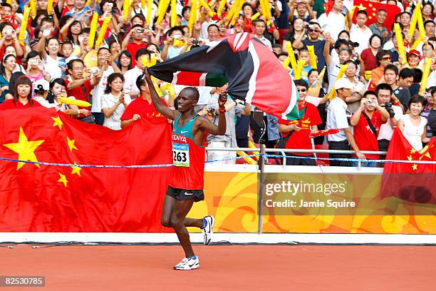 Sammy Wanjiru of Kenya celebrates after winning the Men's Marathon in the National Stadium during Day 16 of the Beijing 2008 Olympic Games on August...